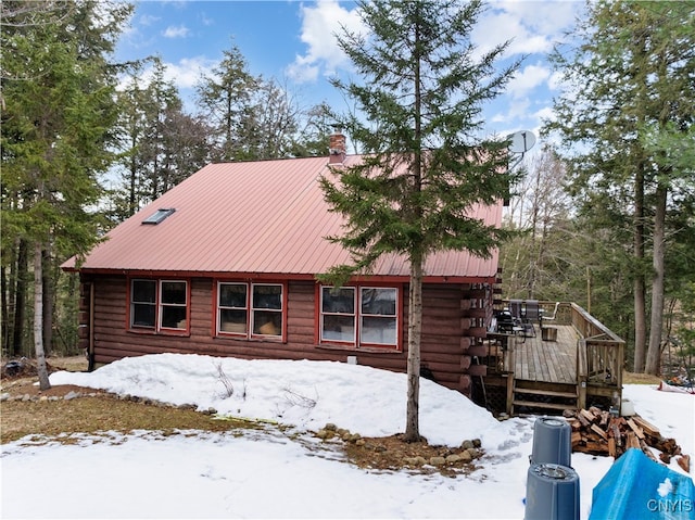 view of front of home with a wooden deck