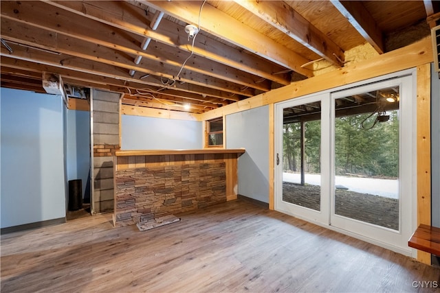 basement with wood-type flooring