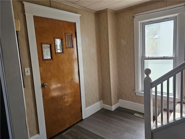 doorway featuring dark hardwood / wood-style floors