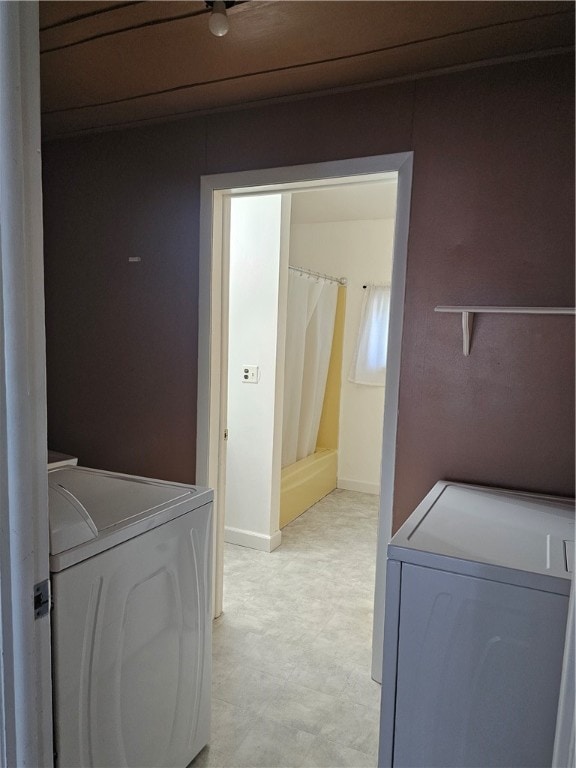 laundry area with washer and clothes dryer