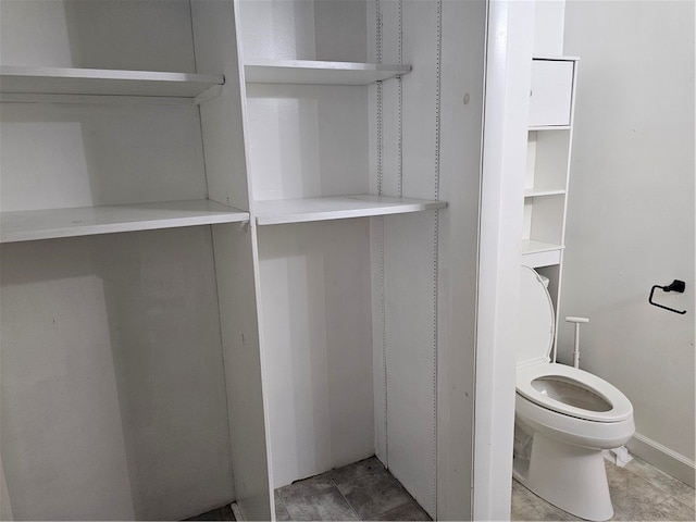 bathroom featuring toilet