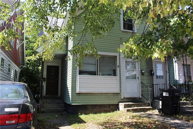 view of front of property with entry steps