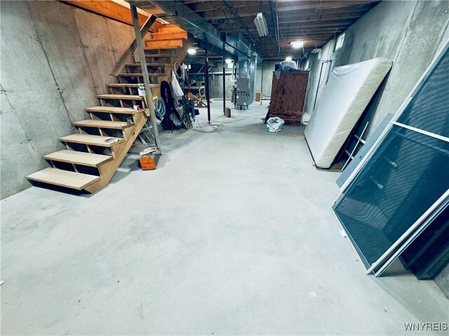 basement featuring heating unit