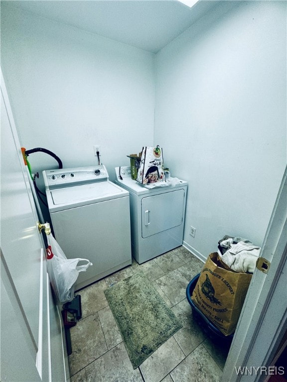 laundry area with washing machine and dryer