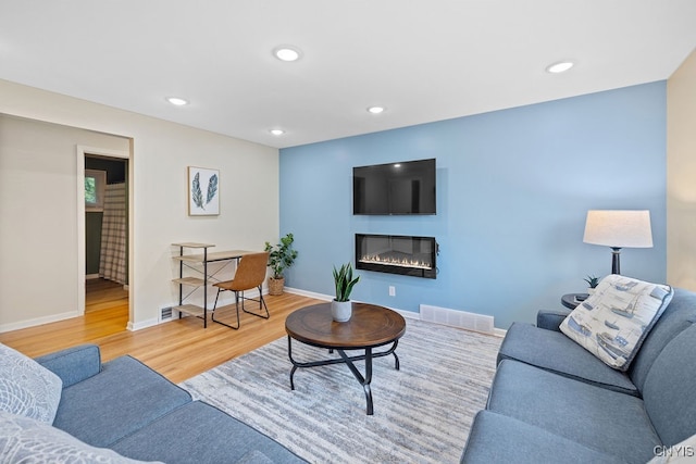 living room featuring light hardwood / wood-style flooring