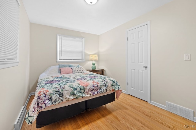 bedroom featuring light wood-type flooring