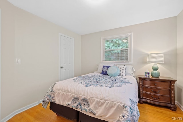 bedroom featuring light hardwood / wood-style floors