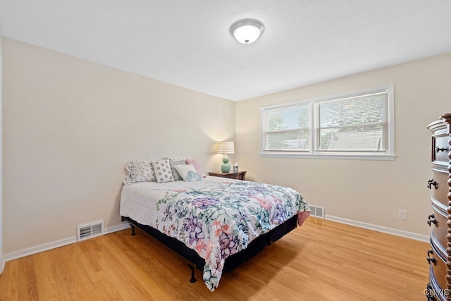 bedroom with light hardwood / wood-style flooring