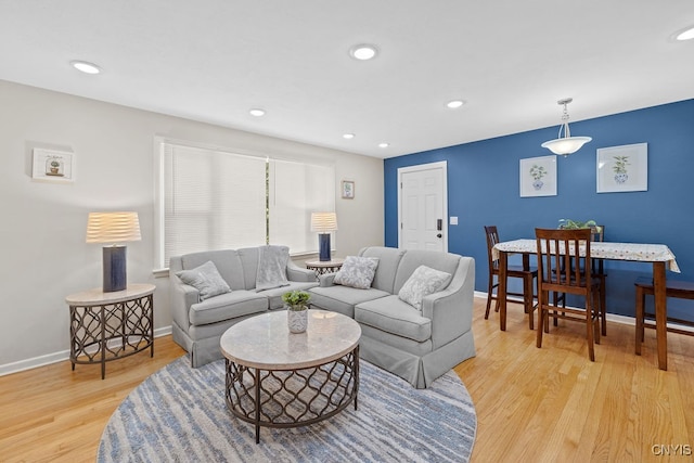 living room with light hardwood / wood-style floors