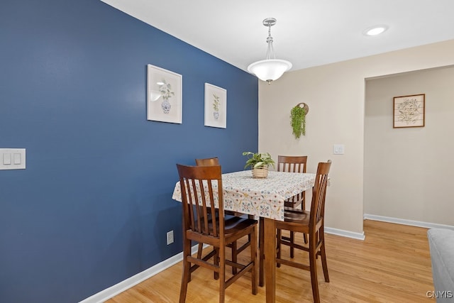 dining room featuring light hardwood / wood-style flooring