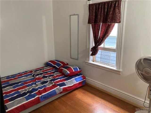 bedroom featuring hardwood / wood-style flooring