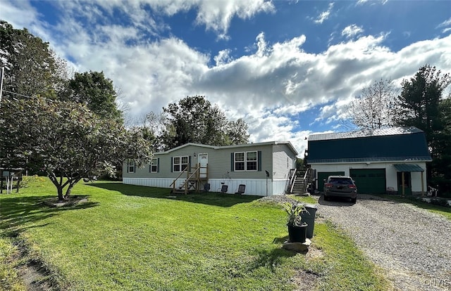 view of front facade featuring a garage and a front lawn