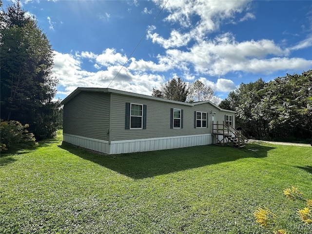 exterior space with a yard