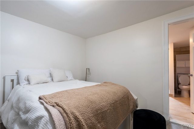 bedroom with light wood-type flooring