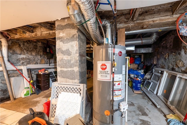 utility room featuring water heater