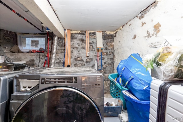 clothes washing area featuring washer / clothes dryer