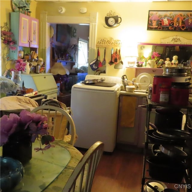 kitchen featuring washer / dryer and wood-type flooring