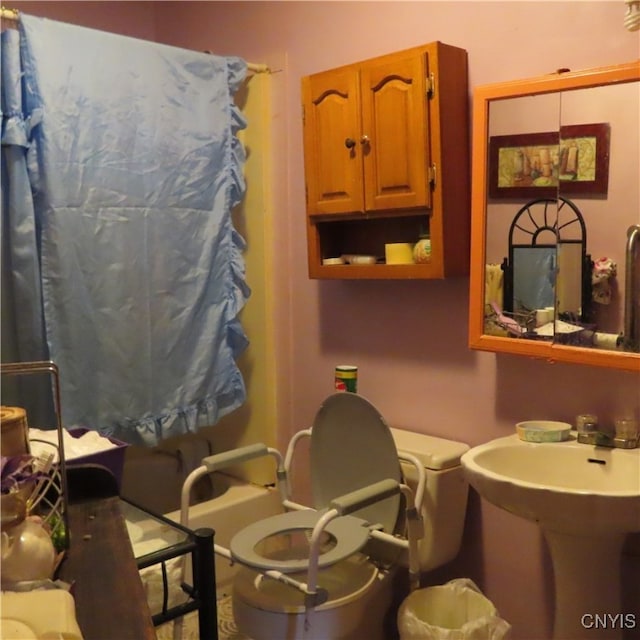 bathroom featuring toilet