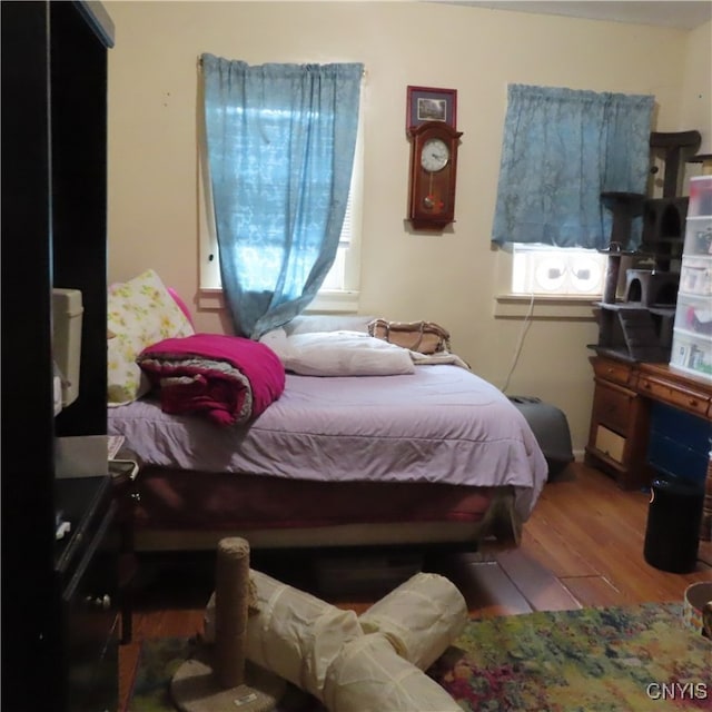 bedroom featuring hardwood / wood-style floors