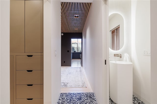 hall featuring tile patterned floors