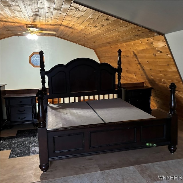 bedroom featuring wood walls, wooden ceiling, and vaulted ceiling