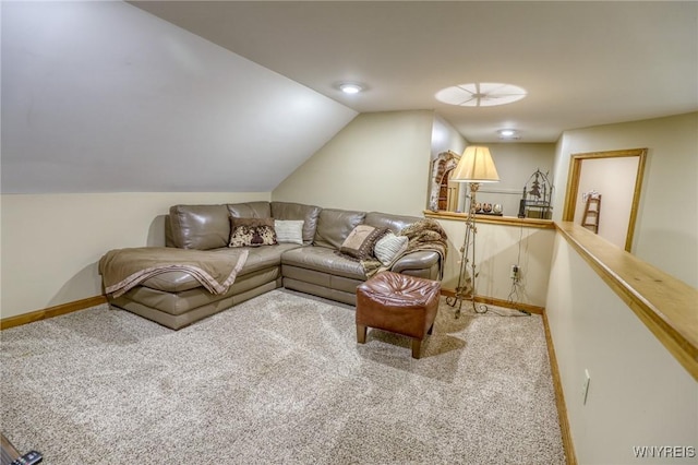 living room featuring lofted ceiling and carpet floors