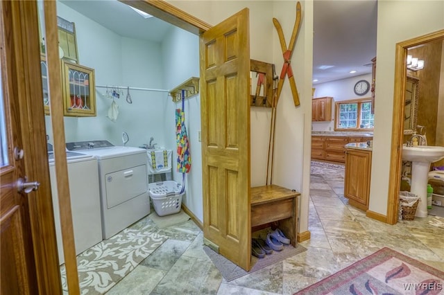 laundry room with washer and clothes dryer