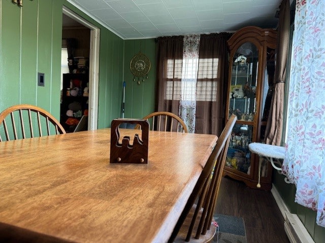 dining room with dark wood-type flooring