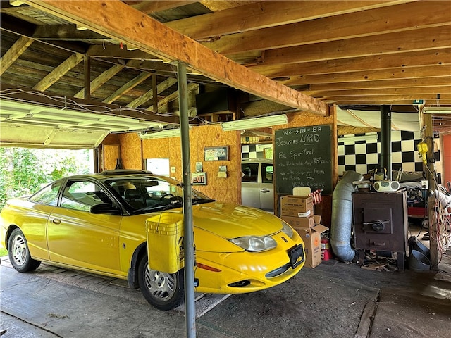 garage featuring a carport