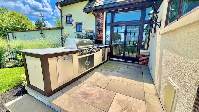 view of patio featuring area for grilling and grilling area