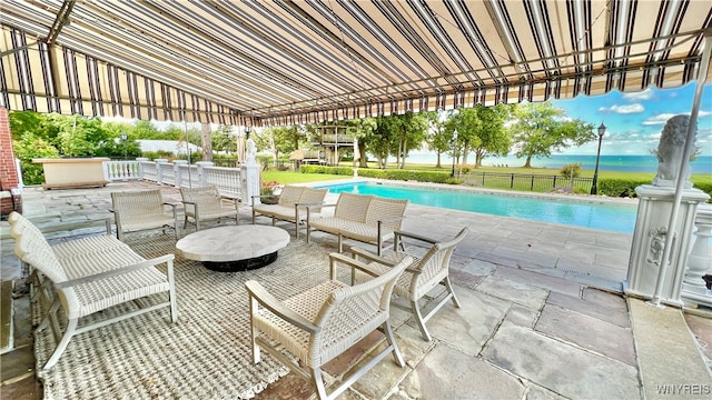 view of patio / terrace featuring a fenced in pool