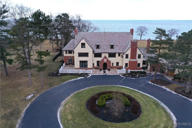 birds eye view of property featuring a water view