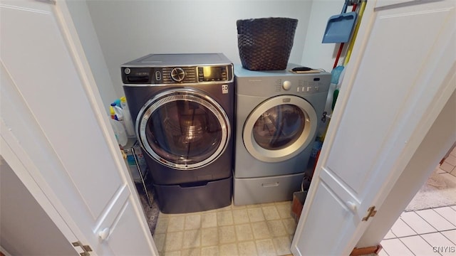 laundry area featuring washing machine and dryer