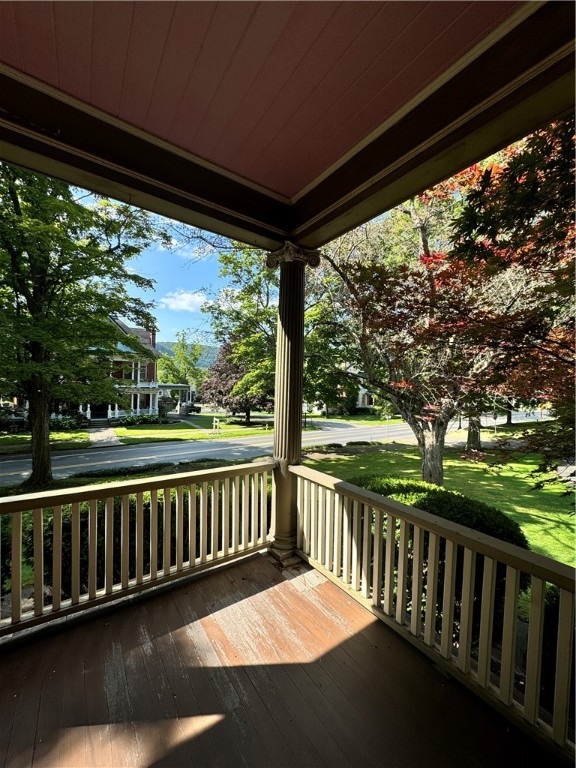 wooden terrace featuring a porch