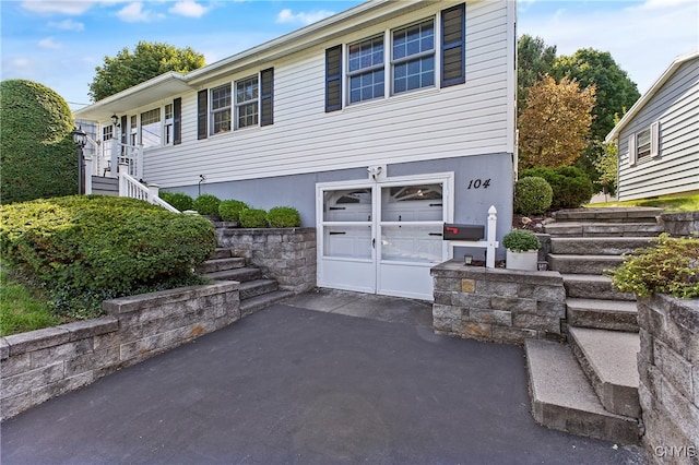 view of front of property with a garage