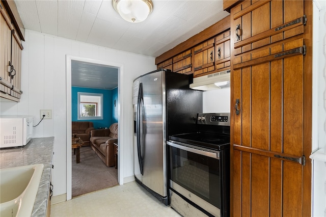 kitchen featuring appliances with stainless steel finishes and sink