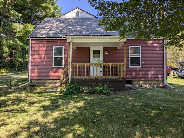 view of front facade with a front lawn and a porch