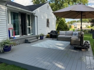 deck featuring outdoor lounge area