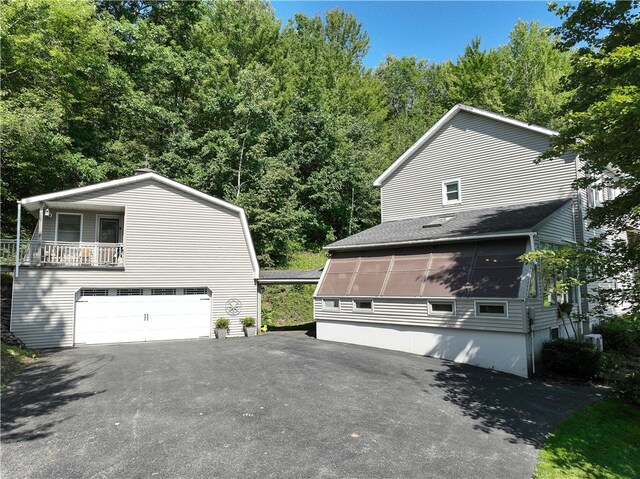 view of home's exterior with a garage