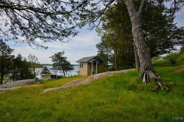 view of yard with a water view