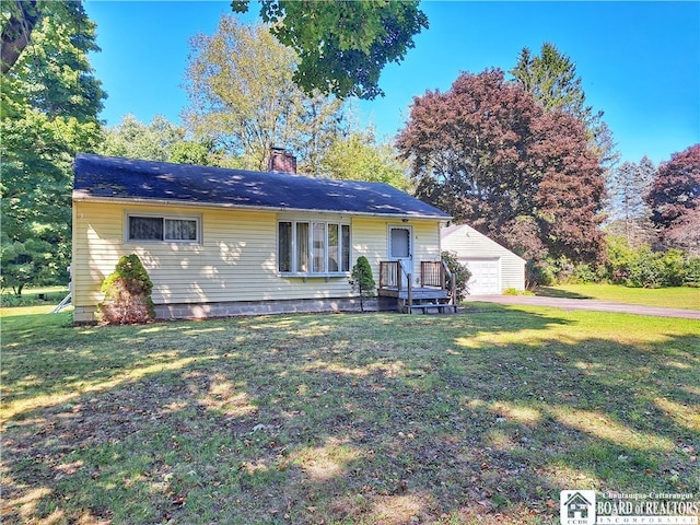 single story home with a garage and a front lawn