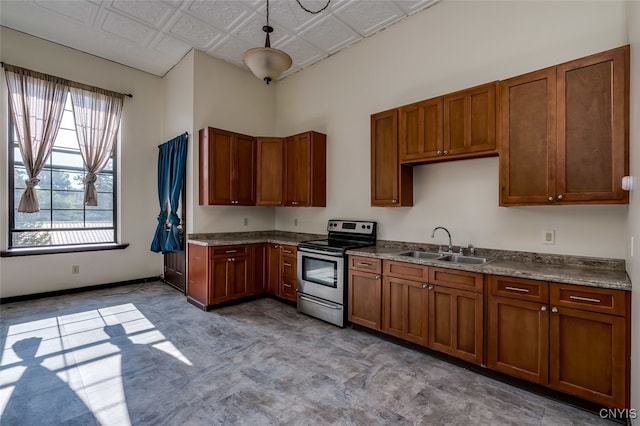 kitchen featuring sink and stainless steel range with electric cooktop