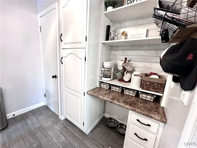 mudroom with dark hardwood / wood-style flooring