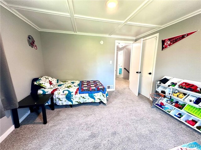 bedroom with crown molding, a closet, and carpet floors