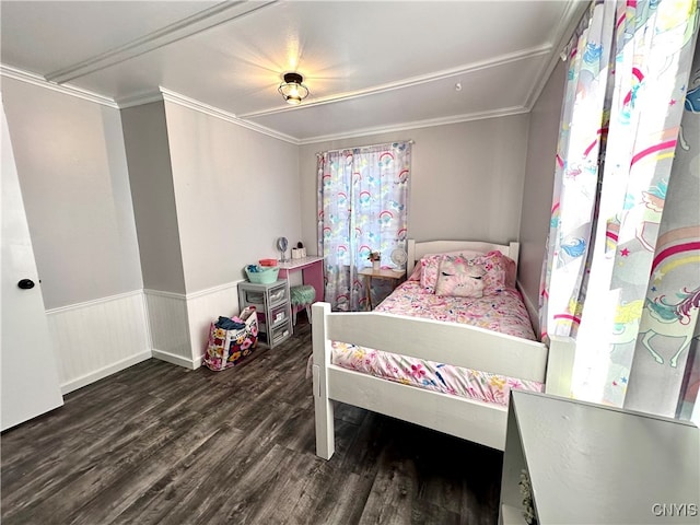 bedroom featuring dark hardwood / wood-style floors and ornamental molding