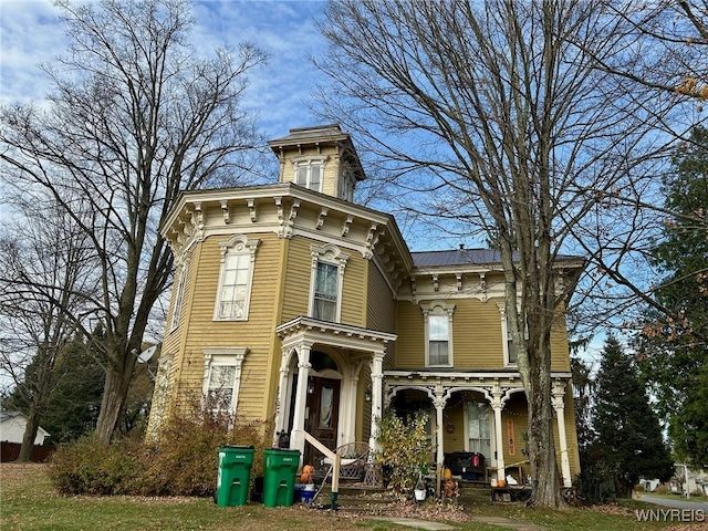 italianate house featuring covered porch