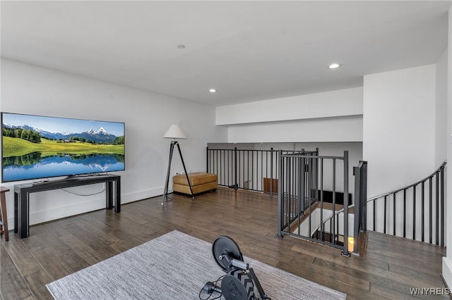 workout room with dark hardwood / wood-style floors