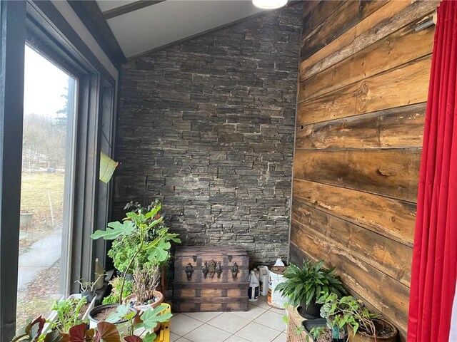 interior space featuring wooden walls