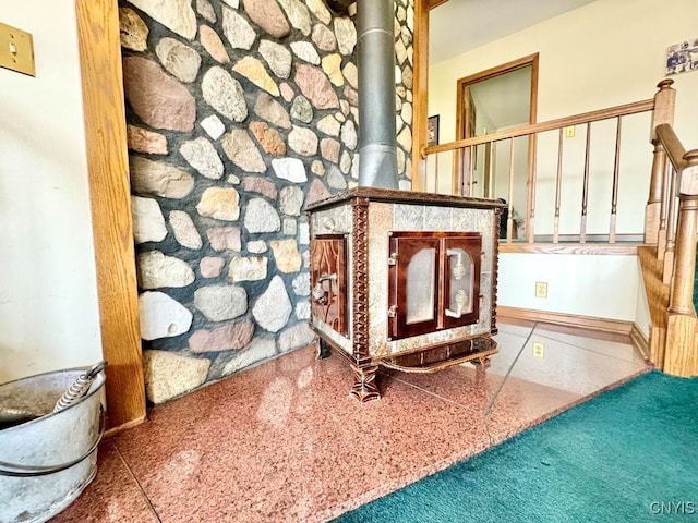 interior space featuring a wood stove