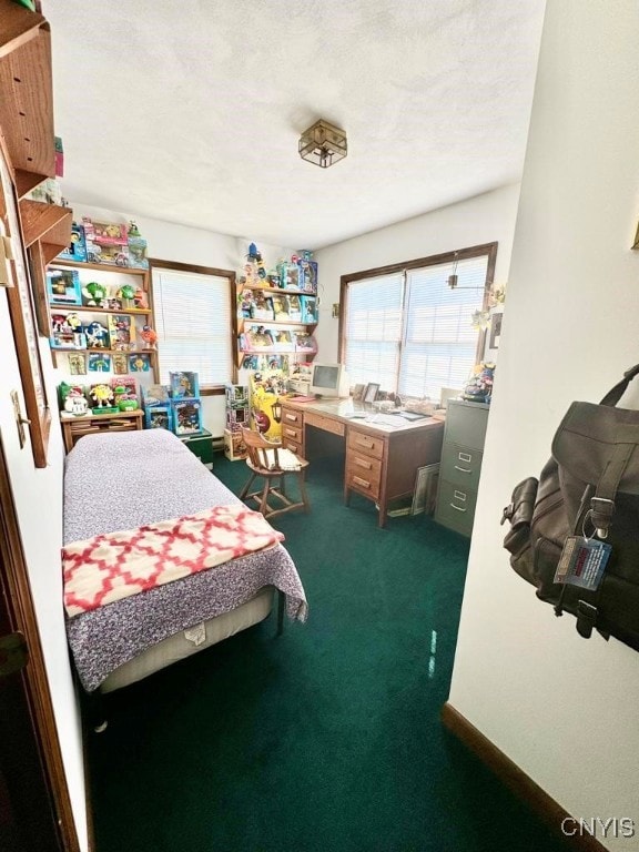 carpeted bedroom with a textured ceiling